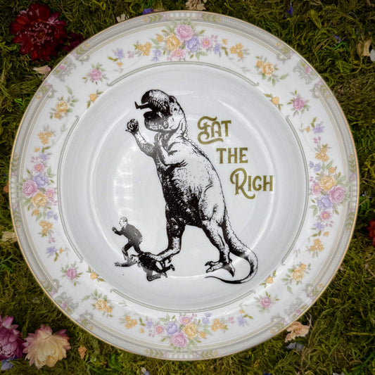 'Dino Eats CEOs,' (8.5 in plate)